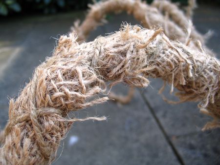 detail of leg wrapped in hessian